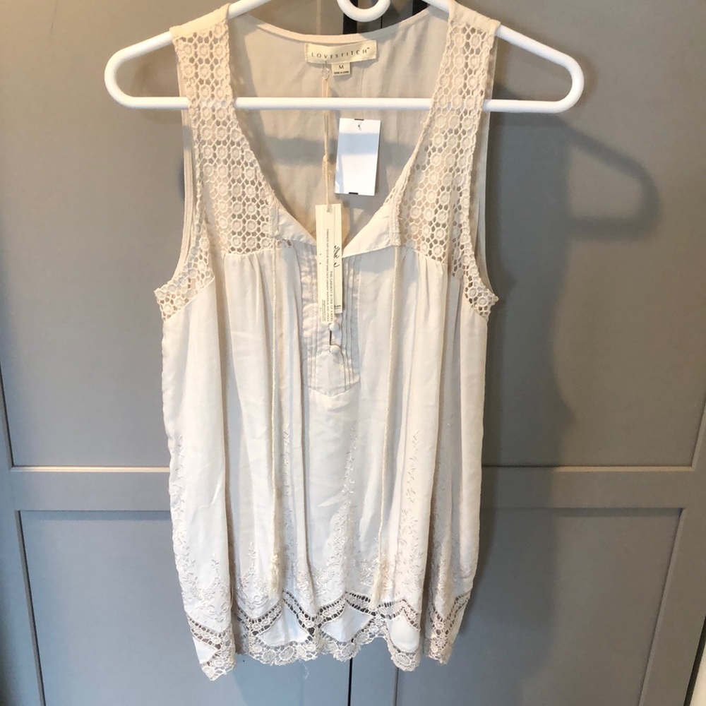 Cream crochet tank top.